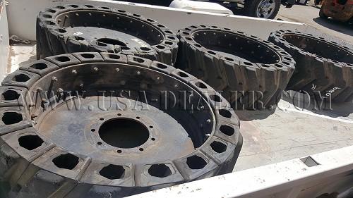 4 SKID STEER AIRBOSS TIRES AND RIMS - Downtown, Los Angeles, California